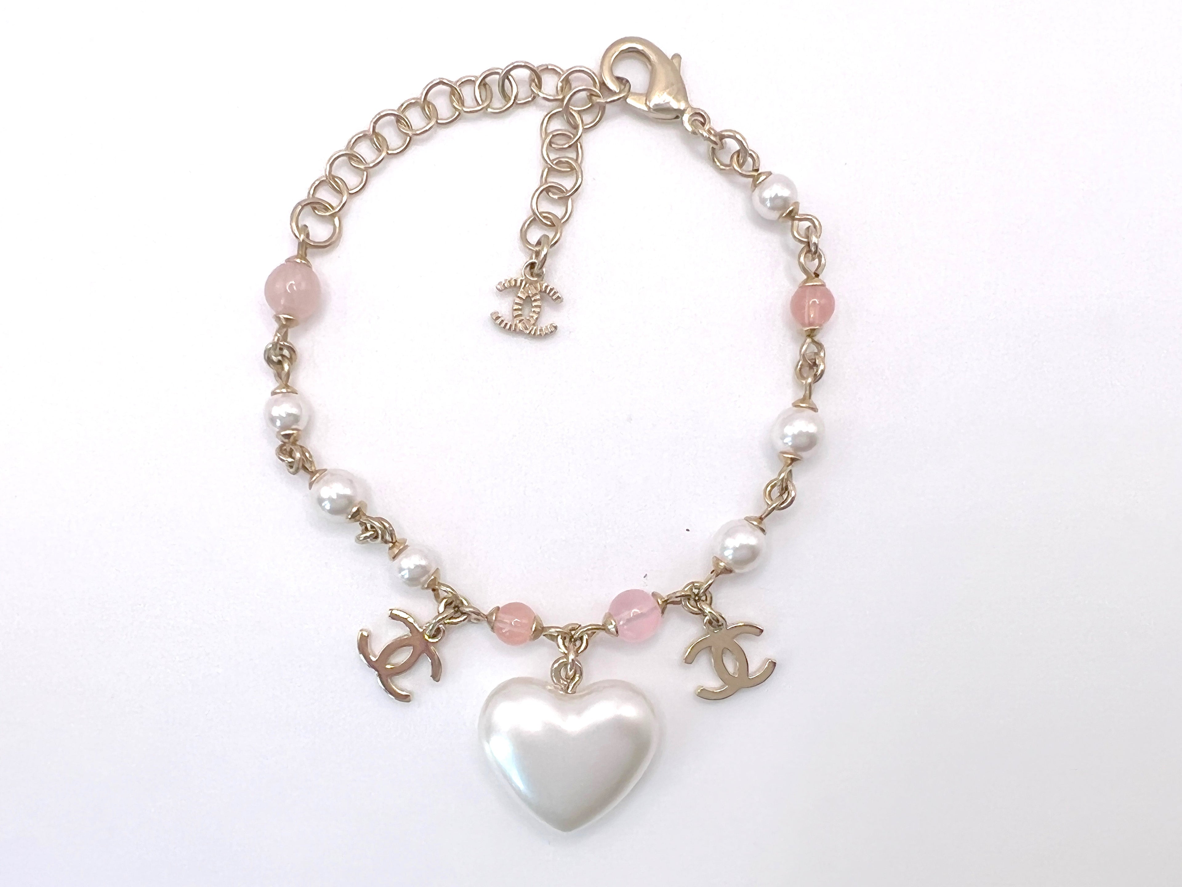 Chanel 21A Coco Neige Pearl Heart and CC Charm Bracelet