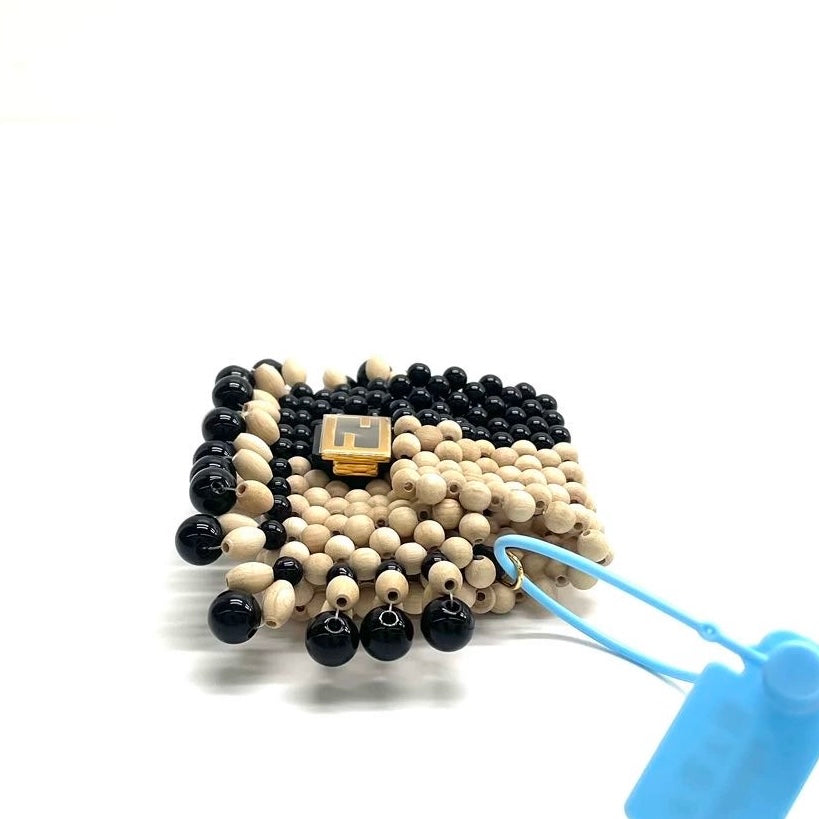 Fendi Micro Acrylic Wood Beaded Pico Baguette Charm Headphone Holder Black and Natural