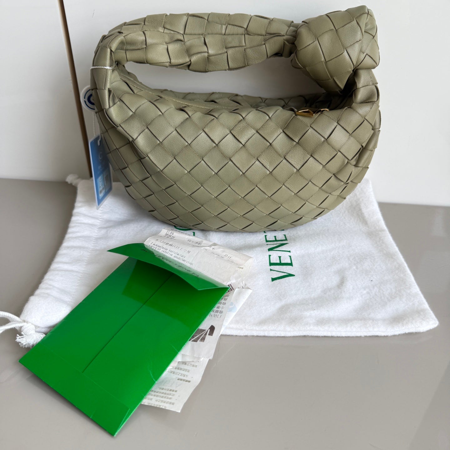 Bottega Veneta Jodie Mini Travertine Green Lambskin Leather Clutch Bag